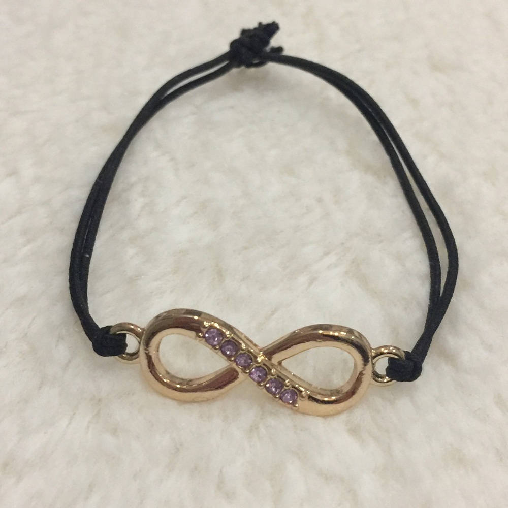 Gold plated Infinity Bracelet w/ Purple Crystals